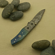 Handcrafted Foldable Pocket Knife with Custom Damascus Blade and Intricate Handle Design - An Exceptional and Personalized Present for Men, Made in the USA. Knives Terror Defender 